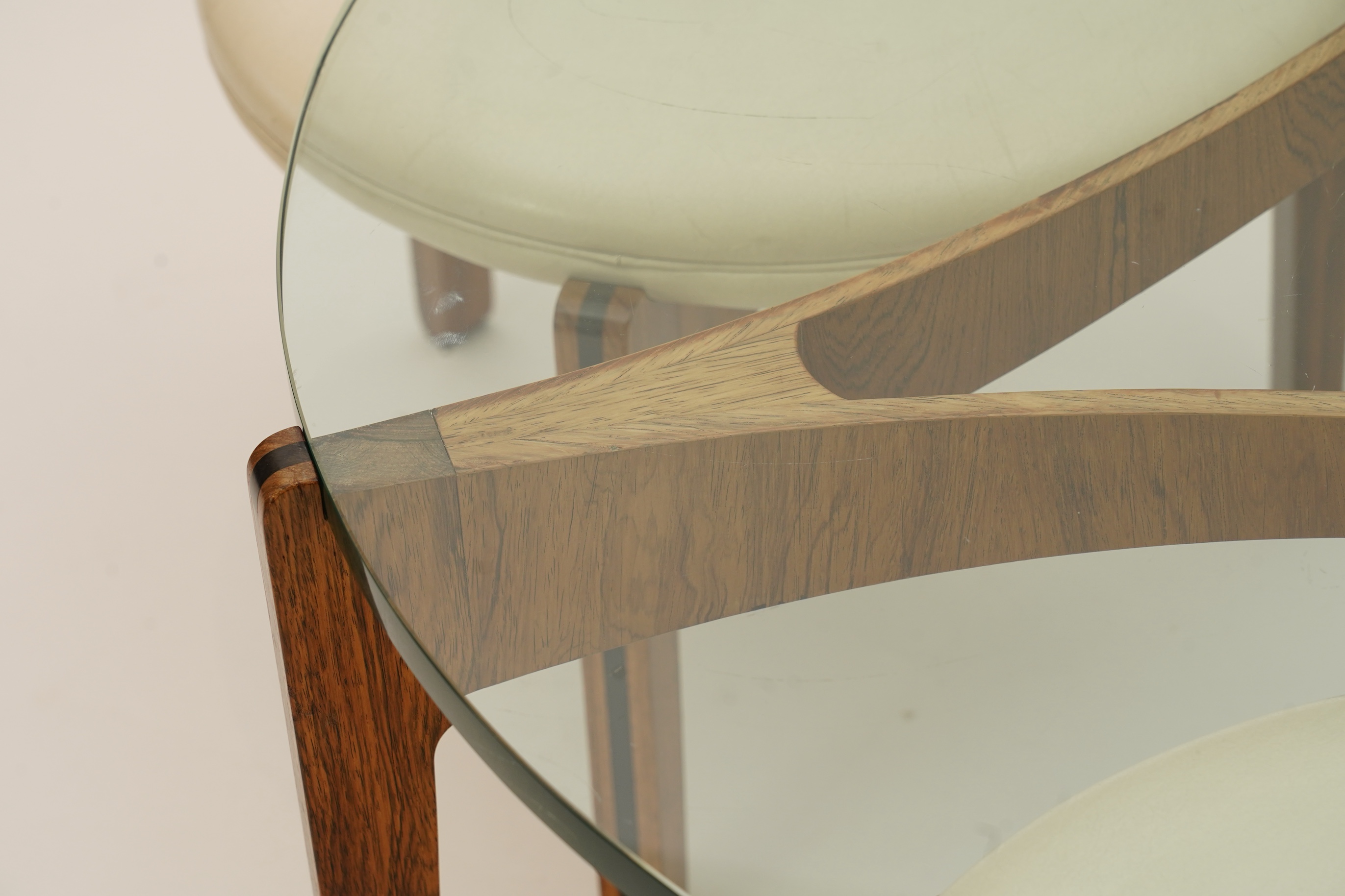 Sven Ellekaer (Danish, 1926-1984) for Christian Linneberg Møbelfabrik: A coffee table and three nesting stools ensuite